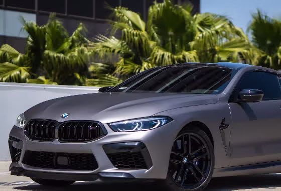 Front of a BMW M8 in a satin matte finish from full-body XPEL Stealth paint protection film by Monarch